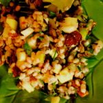 brown rice salad on green plate