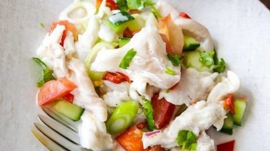 Raw fish salad on a plate
