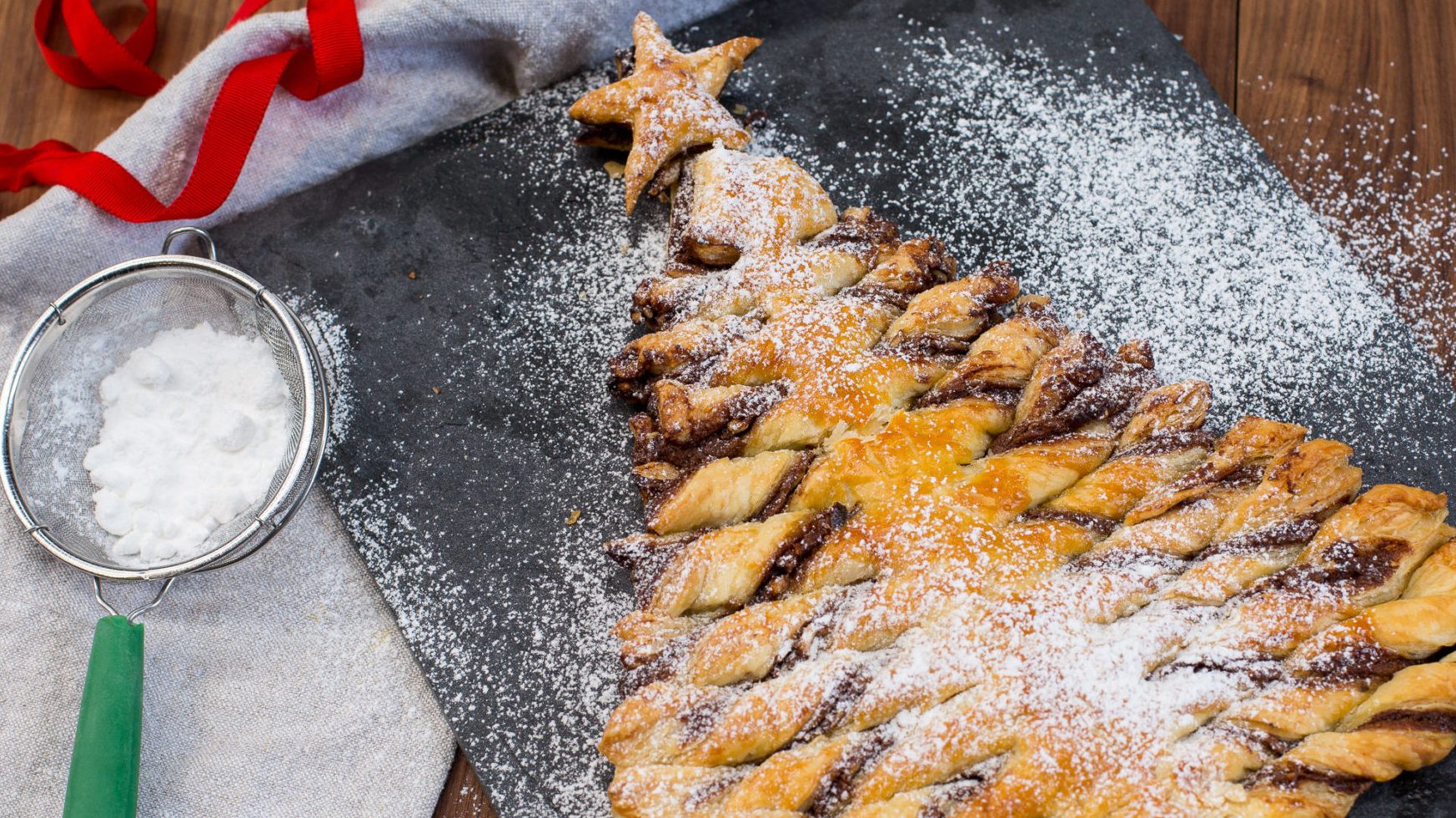 Christmas tree made of pastry willed with chocolate hazelnut spread
