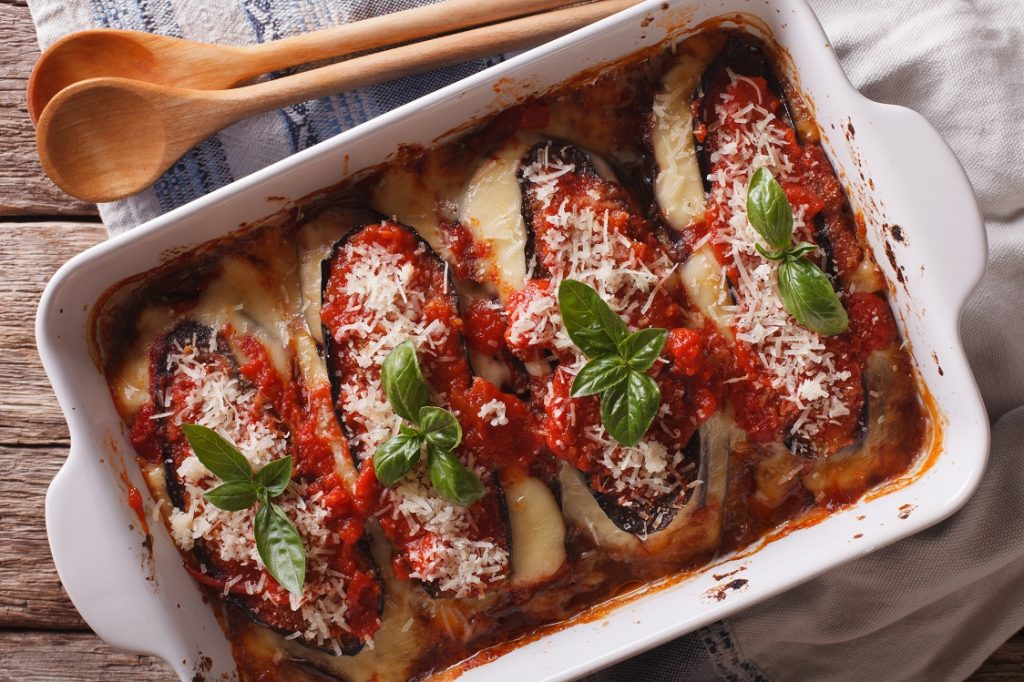 Baked eggplant parmigiana with fresh basil