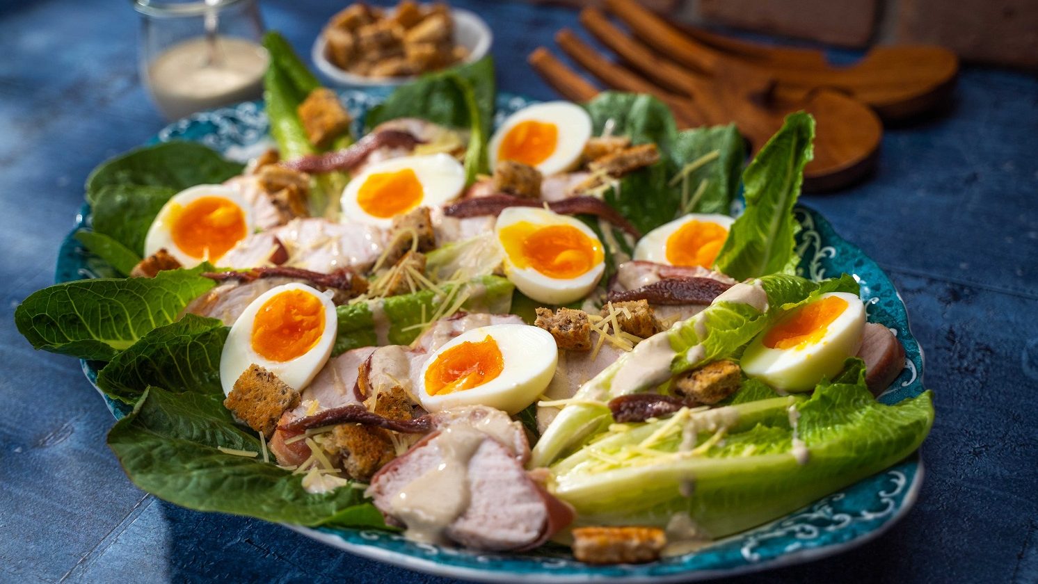Chicken Caesar Salad with soft boiled eggs and croutons