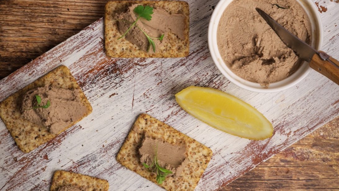 Pate in a pot and on crackers with a wedge of lemon.