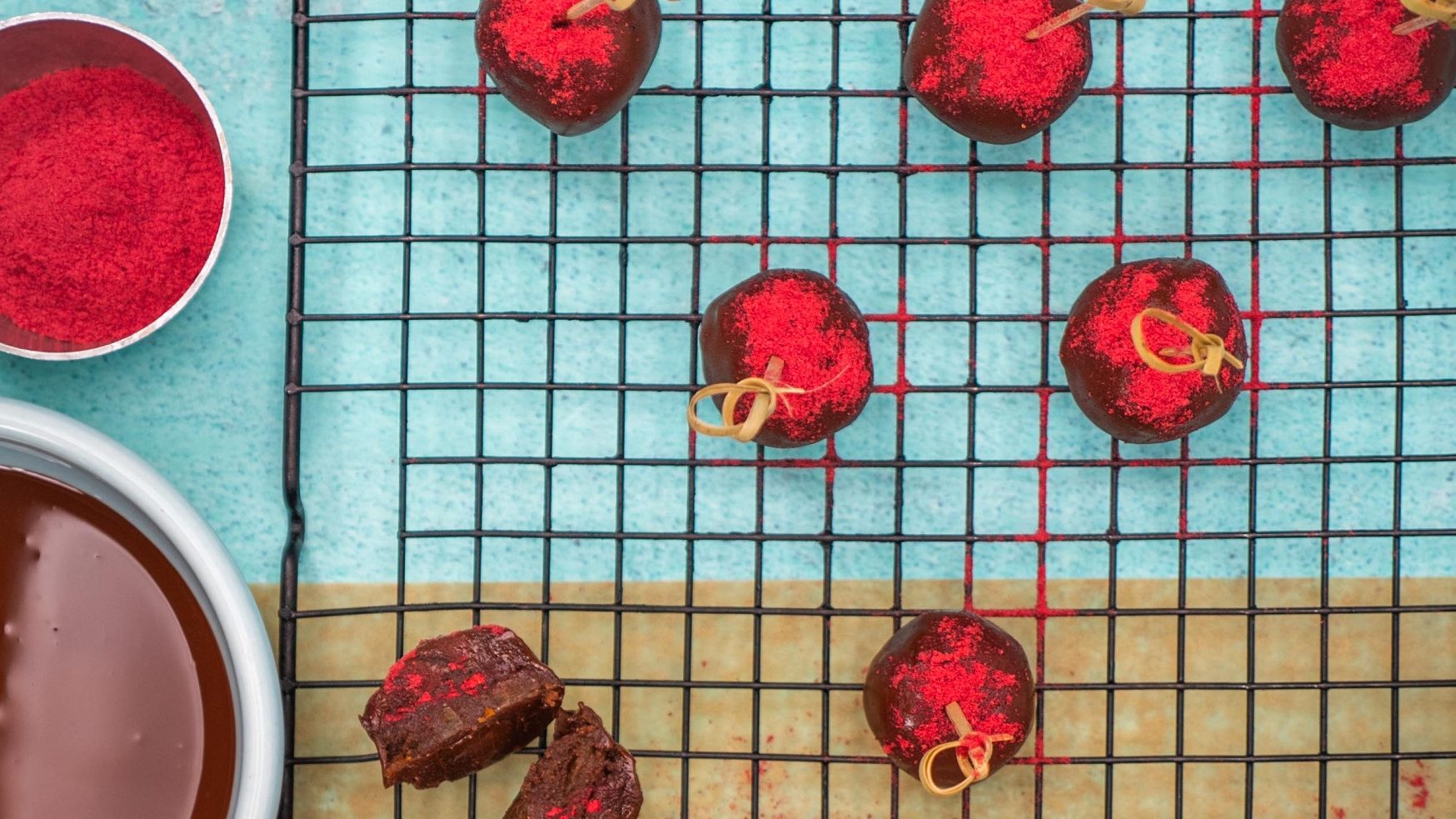 Chocolate pops covered in freeze-dried raspberry powder