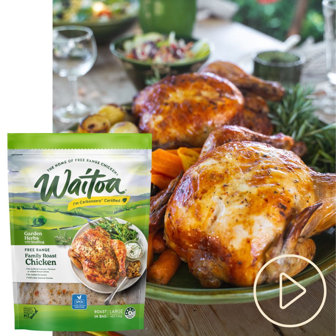 A Waitoa Free Range Family Roast chicken in its packaging next to a plate with roast chicken and vegetables. Image includes a video play button.