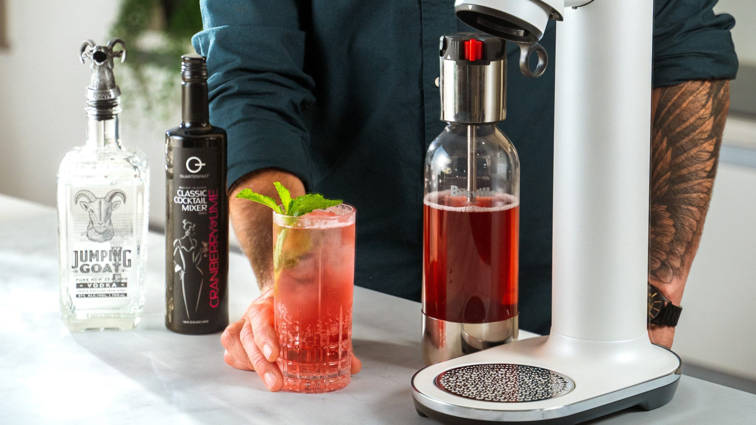 Cranberry & lime fizz with Breville InFizz, Jumping Goat vodka and QuarterPast Cranberry & Lime syrup