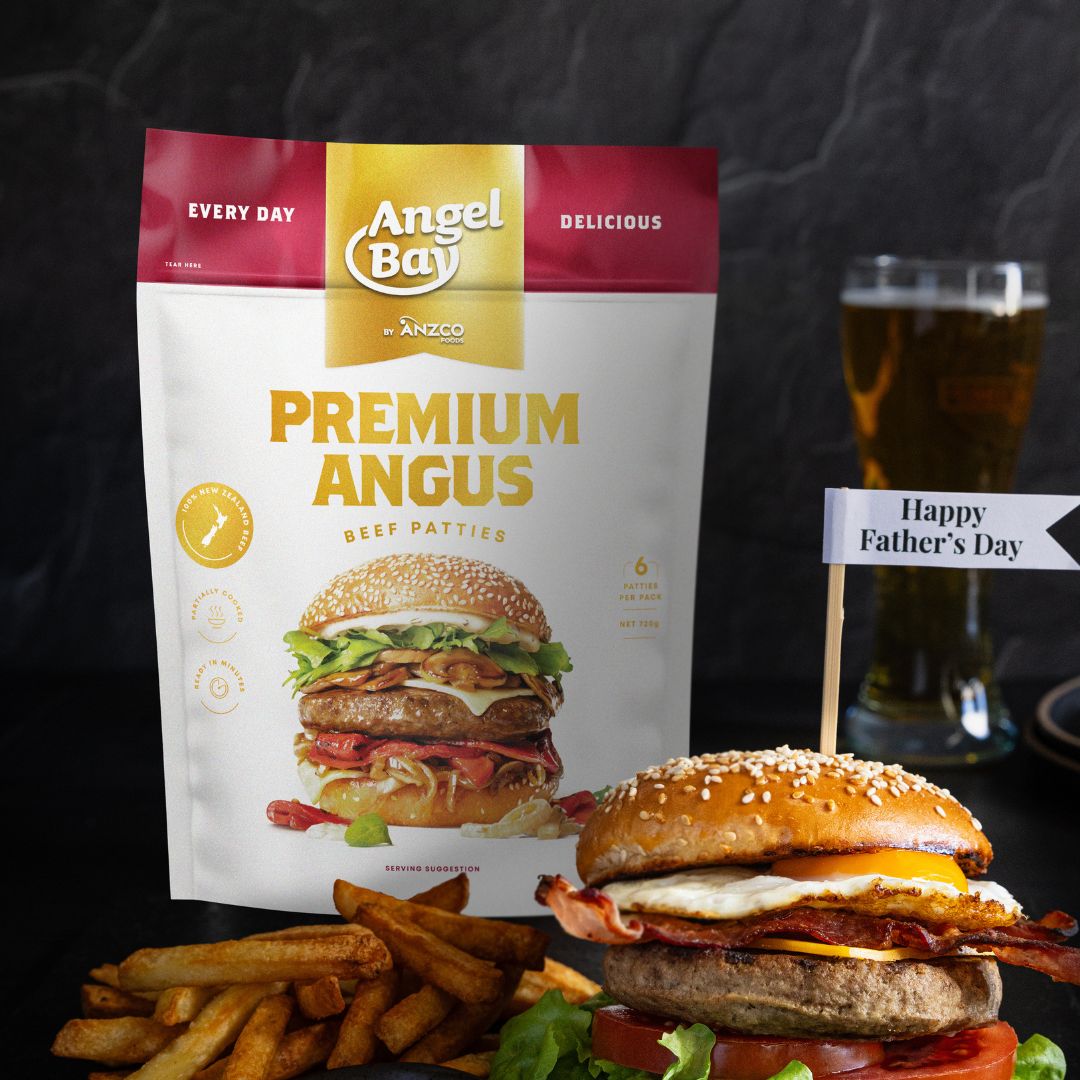 A pack of Angel Bay Premium Angus Beef Patties with a hamburger in the foreground