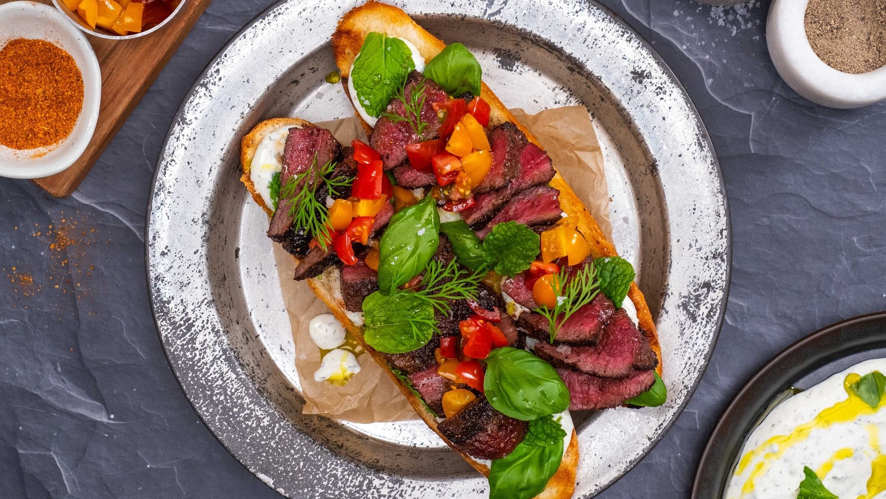 Philly style sliced Venison steak sandwich duo, grilled on the BBQ and served with choice toppings of tzatziki, capsicum, tomatoes, dill and mint.