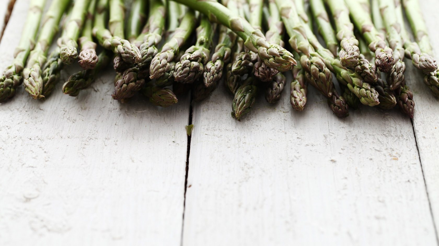 Asparagus on a wooden board